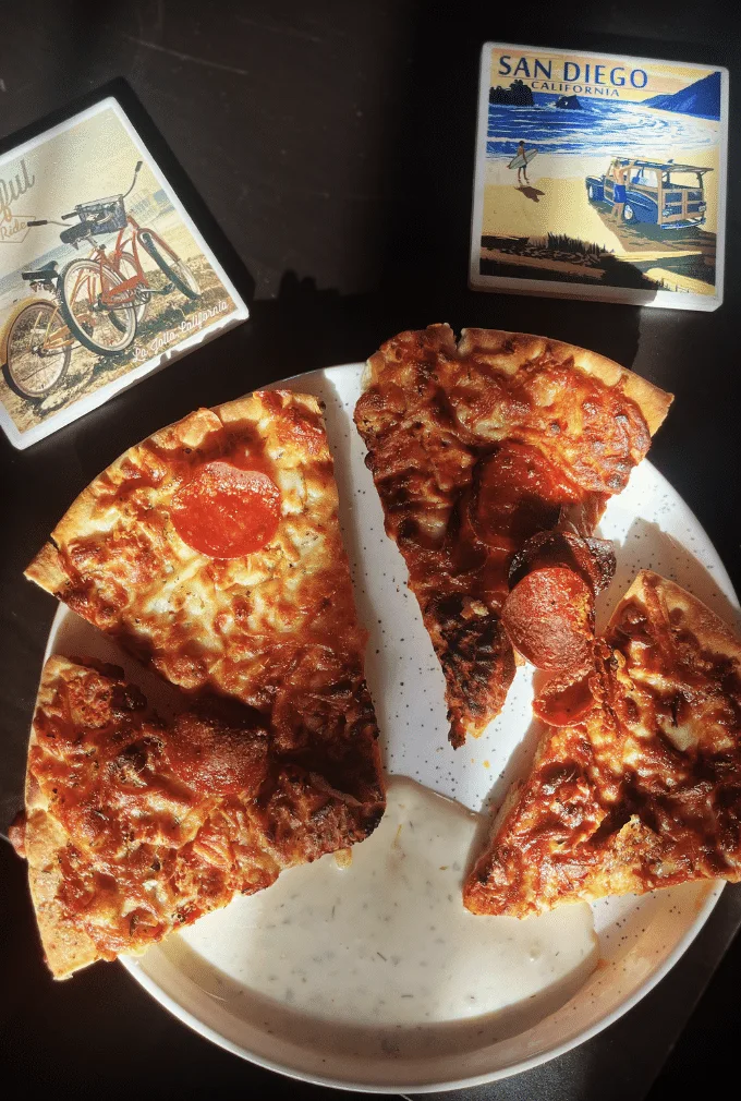 Top View of Pizza slices with Ranch Dressing